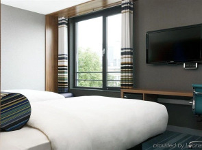 Отель Aloft Brussels Schuman