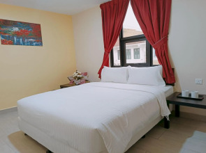 Capital O 90897 Island City Hotel