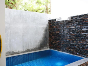 One World One Home Naiharn Hotel