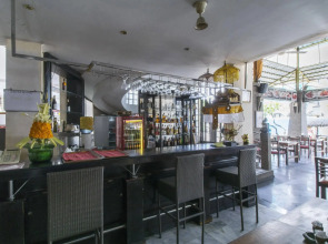 Отель Melasti Kuta Beach Hotel and Spa