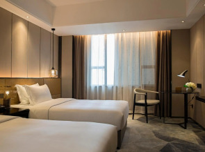 Paco Business Hotel Datang Metro Station