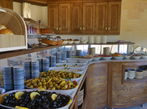 Ada Cave Suites Hotel