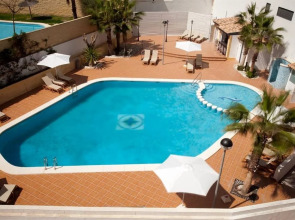 Hotel La Familia Gallo Rojo