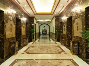 Magnum Hotel & Suites West Bay