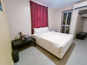 Capital O 90897 Island City Hotel