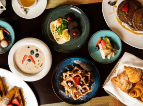 Hilton Salwa Beach Resort & Villas