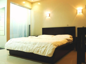 Rumi Apartelle Hotel