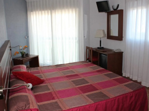 Hotel La Familia Gallo Rojo