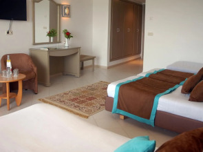 Курортный отель Riadh Palms Resort & Spa