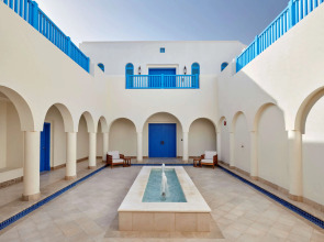 Hilton Salwa Beach Resort & Villas