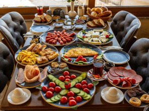 Ada Cave Suites Hotel