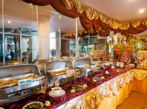 Отель Melasti Kuta Beach Hotel and Spa