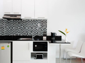 One World One Home Naiharn Hotel