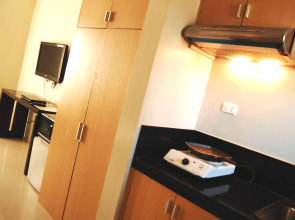 Rumi Apartelle Hotel