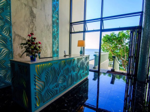 Отель Norn Talay Surin Beach Phuket