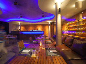 Отель Norn Talay Surin Beach Phuket