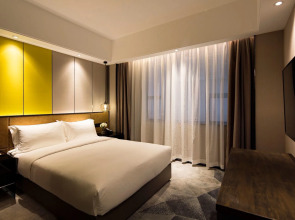 Paco Business Hotel Datang Metro Station