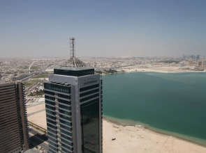 Magnum Hotel & Suites West Bay