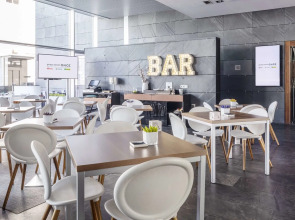 Отель ILUNION Atrium