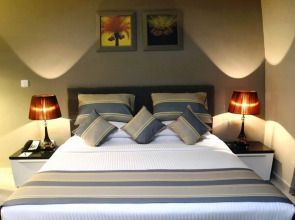 Magnum Hotel & Suites West Bay