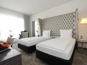 Отель Arcotel John F 