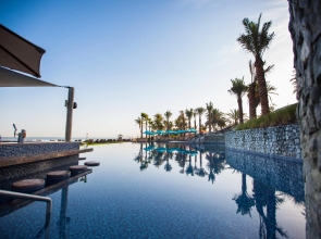 Отель JA The Resort - JA Palm Tree Court