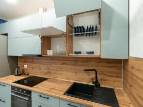 Апартаменты с панорамными окнами на набережной реки