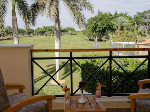 Курортный Отель Swiss Inn Pyramids Golf Resort