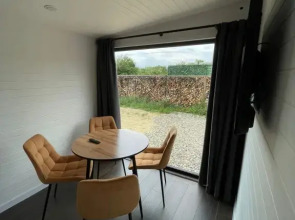 Бунгало Скандинавское на двоих с панорамными окнами, террасой и финским банным чаном на дровах