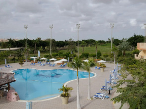 Курортный Отель Swiss Inn Pyramids Golf Resort