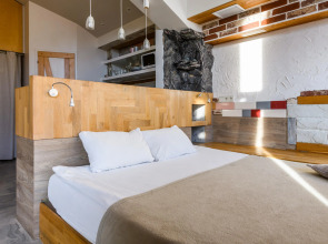 Апартаменты Оплот ETHNICA Дизайн Студия | 40м² | 3 Этаж Ваше Окно в Горы