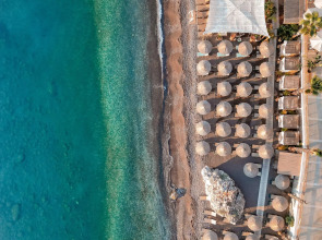 Отель Pilos Suites