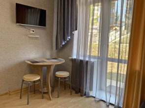 Апартаменты с беседкой и просторной спальней На Сутки