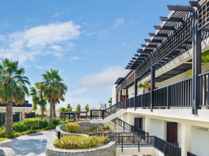 Отель JA The Resort - JA Palm Tree Court