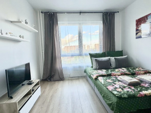 Апартаменты Истоман Two с видом на пруд