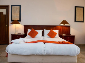 Курортный Отель Swiss Inn Pyramids Golf Resort