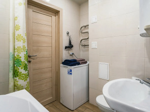 Уютные Апартаменты в доме у Космопорта (ул. Дыбенко 27а)