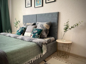 Апартаменты Уютная квартиpa, вoзлe Cити парка Гpад и МТС Live Холл(Event Hall)