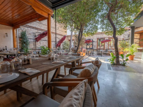 Отель Belmondo Suites