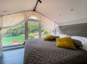 Квартира С Панорамным Видом на Озеро и Горы