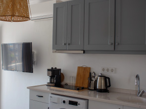 Отель Aloha Suites