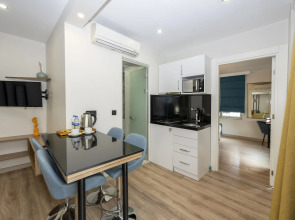 Отель The Marions Suite