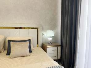 Апартаменты New Kamolon Tashkent by Rnb estate