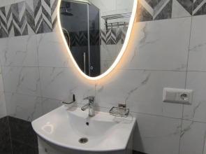 Квартира Уютные апартаменты возле парка Ынтымак