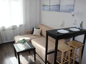 Апартаменты Уютная Двухуровневая Студия в Центре Города