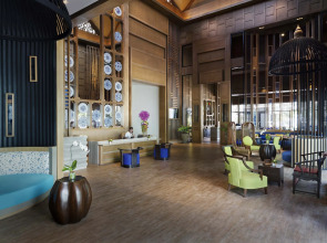 Отель OUTRIGGER Surin Beach Resort