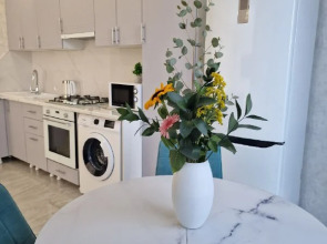 Квартира Flatirini с панорамными окнами в новом ЖК 1