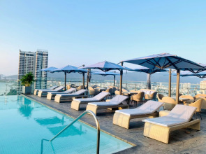 Отель Wink Danang Riverside Residence Suites - 24hrs Stay & The Best View in Town