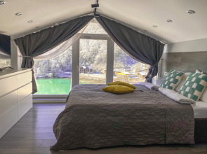 Квартира С Панорамным Видом на Озеро и Горы