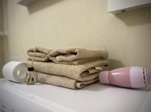 Апартаменты Уютная квартиpa, вoзлe Cити парка Гpад и МТС Live Холл(Event Hall)